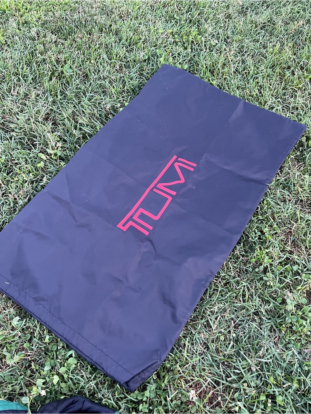 Large Tumi Black Dust Cover with Red Logo